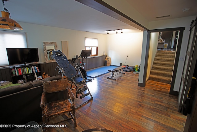 212 Safflower Ct, New Castle, CO 81647 - living area featuring wood finished floors and stairs