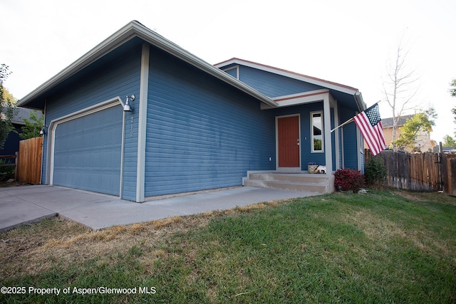 212 Safflower Ct, New Castle, CO 81647 - view of front of property featuring a garage and concrete driveway