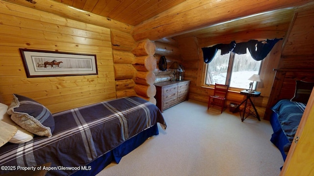 2418 Usfs Rd Unit 526, Creede, CO 81130 - carpeted bedroom with wood ceiling and rustic walls