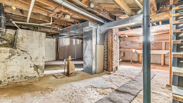 basement featuring heating unit