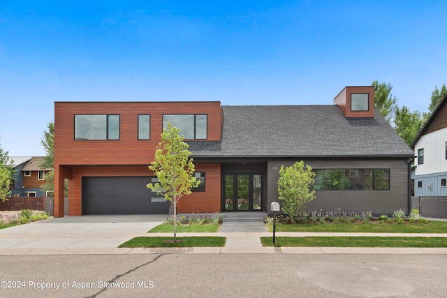 view of front of property with a garage