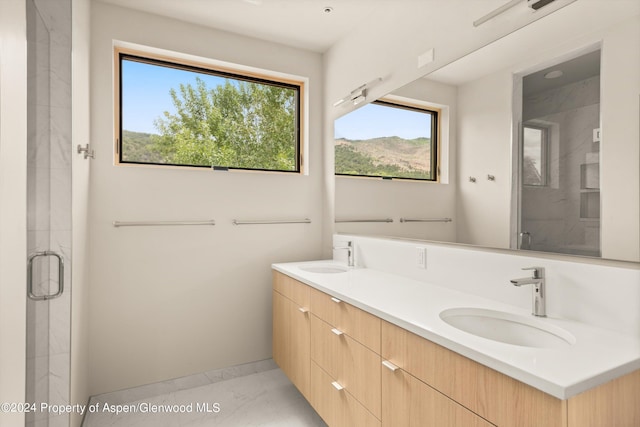 bathroom featuring vanity and walk in shower