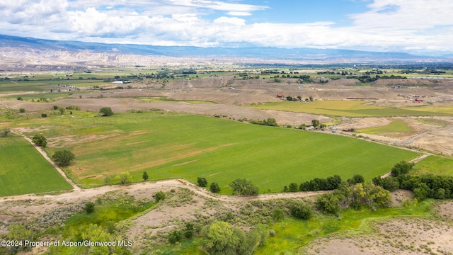 bird's eye view with a mountain view and a rural view