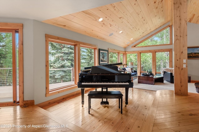 554 Sinclair Rd, Snowmass Village, CO 81615 - sitting room featuring light wood-style floors, vaulted ceiling, plenty of natural light, and wooden ceiling