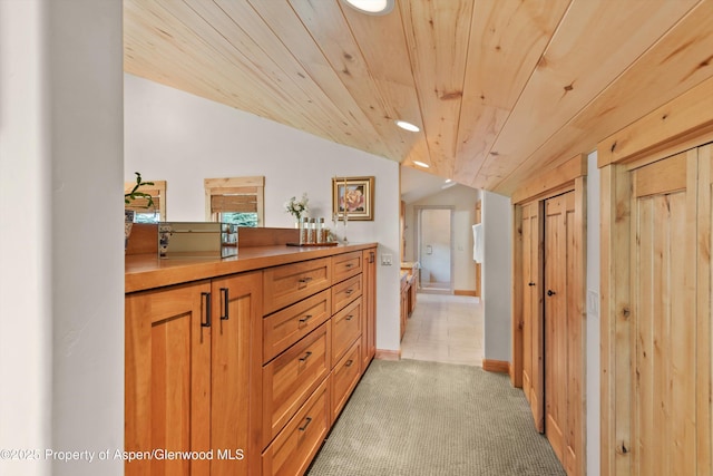 554 Sinclair Rd, Snowmass Village, CO 81615 - hallway featuring vaulted ceiling, wooden ceiling, recessed lighting, and light carpet