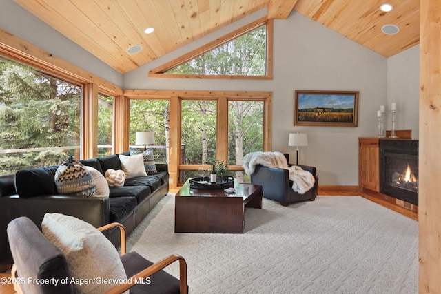 554 Sinclair Rd, Snowmass Village, CO 81615 - living room featuring lofted ceiling, a glass covered fireplace, recessed lighting, wooden ceiling, and healthy amount of natural light