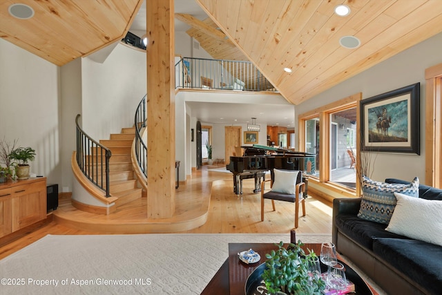 554 Sinclair Rd, Snowmass Village, CO 81615 - living area with lofted ceiling, light wood-type flooring, stairway, recessed lighting, and wood ceiling