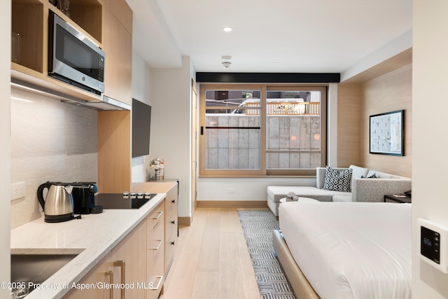 bedroom featuring light hardwood / wood-style floors