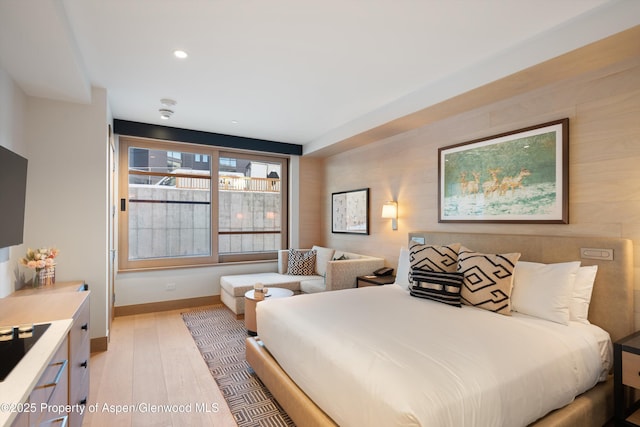 bedroom featuring light hardwood / wood-style flooring