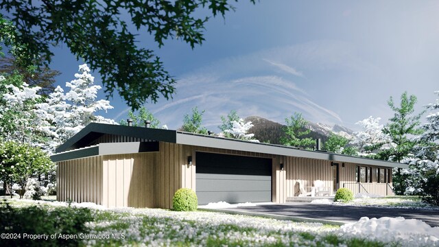 garage featuring a mountain view