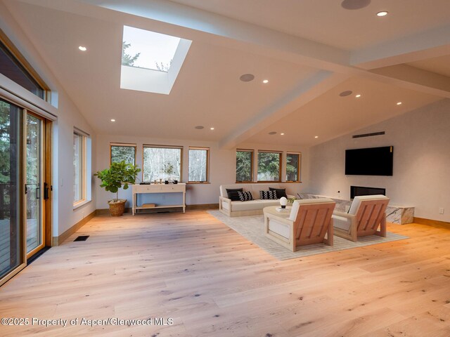 51 Roaring Fork Dr, Aspen, CO 81611 - living area featuring light wood-style flooring, baseboards, recessed lighting, and a skylight