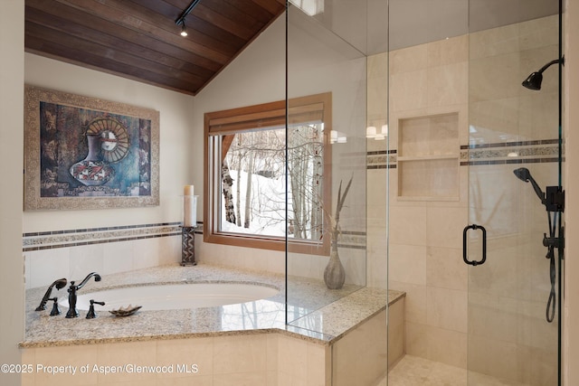 bathroom featuring lofted ceiling, wooden ceiling, a shower stall, and a garden tub