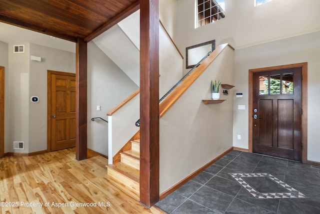 383 Faas Ranch Rd, New Castle, CO 81647 - tiled foyer with stairway and wooden ceiling