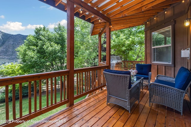 383 Faas Ranch Rd, New Castle, CO 81647 - deck with a mountain view, grilling area, and an outdoor hangout area
