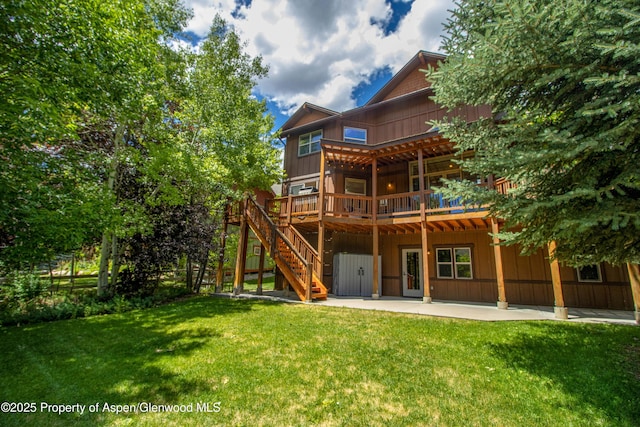 383 Faas Ranch Rd, New Castle, CO 81647 - rear view of house with a wooden deck, a patio area, a yard, and stairs