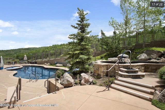 view of pool with a patio