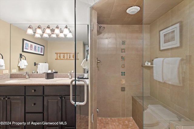 bathroom with vanity and an enclosed shower