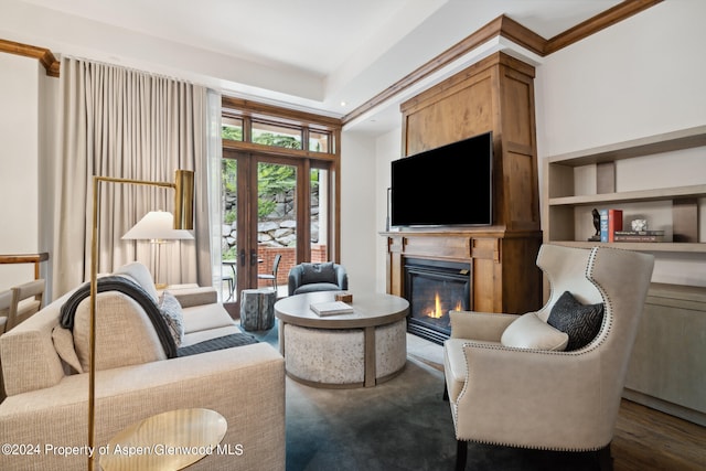 living room featuring crown molding