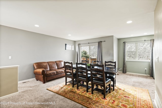 dining room featuring recessed lighting, carpet flooring, visible vents, and baseboards