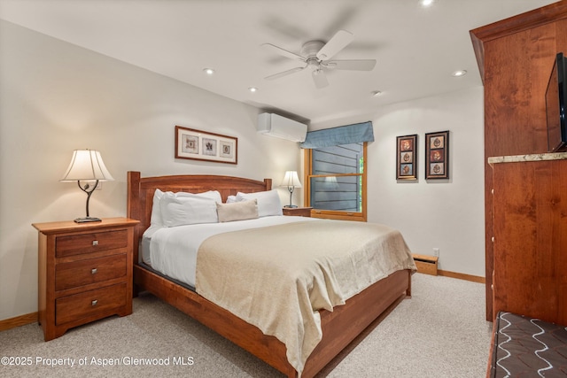 610 S W End St Unit J204, Aspen, CO 81611 - bedroom with carpet, baseboards, a wall unit AC, recessed lighting, and a ceiling fan