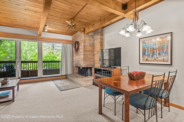 610 S W End St Unit J204, Aspen, CO 81611 - carpeted dining space with wooden ceiling with exposed beams, a ceiling fan, a stone fireplace, a chandelier, and baseboards