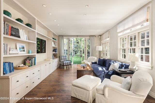 living room with dark wood-type flooring