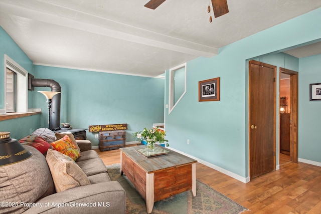 131 Aspen St, Redstone, CO 81623 - living area with wood finished floors, ceiling fan, and stairs
