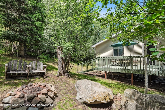 131 Aspen St, Redstone, CO 81623 - view of yard featuring a fire pit and a wooden deck