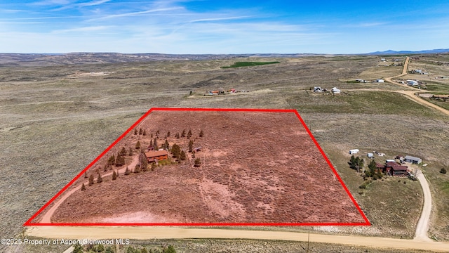 31 Ridge Dr, Craig, CO 81625 - overview of rural landscape featuring property boundaries highlighted and a mountainous background