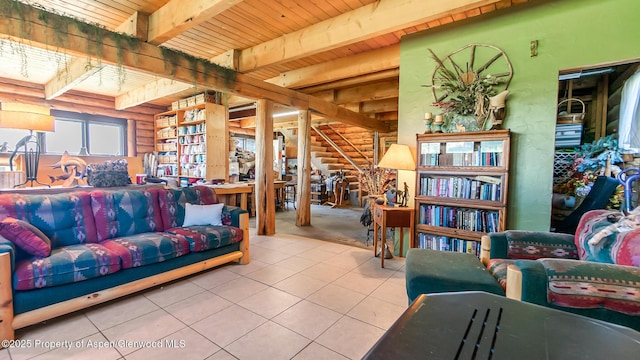 31 Ridge Dr, Craig, CO 81625 - carpeted living area featuring rustic walls, tile patterned floors, wooden ceiling with exposed beams, and stairs