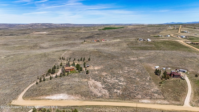 31 Ridge Dr, Craig, CO 81625 - aerial view of property's location with rural landscape and a mountain backdrop