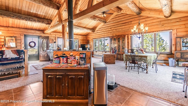 31 Ridge Dr, Craig, CO 81625 - carpeted dining space with wooden ceiling, log walls, tile patterned flooring, a chandelier, and baseboard heating
