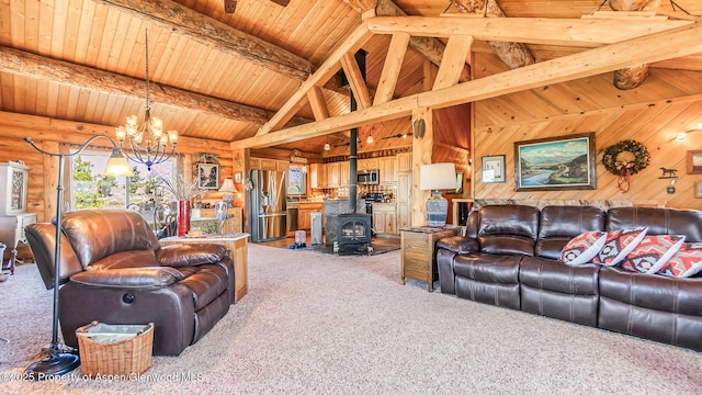 31 Ridge Dr, Craig, CO 81625 - carpeted living area with a wood stove, wooden ceiling, a chandelier, and wooden walls