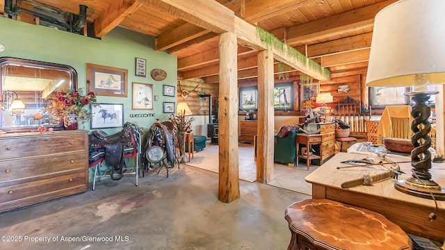 31 Ridge Dr, Craig, CO 81625 - misc room featuring wood ceiling with exposed beams, concrete floors, and plenty of natural light