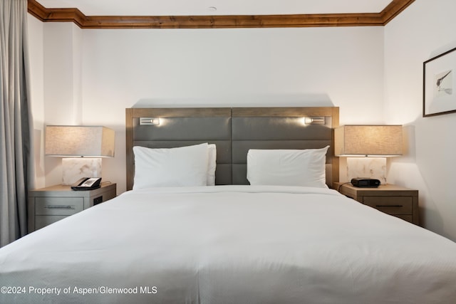 bedroom featuring ornamental molding