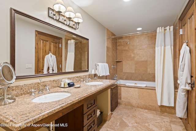 bathroom with vanity and shower / bath combo