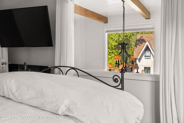 1024 E Cooper Ave Unit 8, Aspen, CO 81611 - bedroom with beamed ceiling