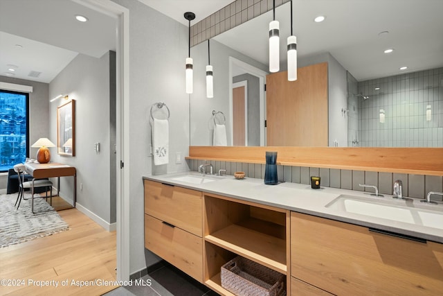 119 Wood Rd Unit 601, Snowmass Village, CO 81615 - full bath featuring double vanity, wood finished floors, recessed lighting, and a tile shower