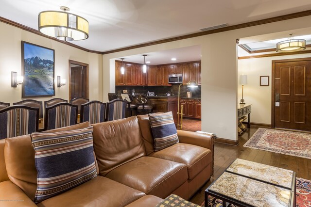 interior space featuring dark hardwood / wood-style flooring and crown molding