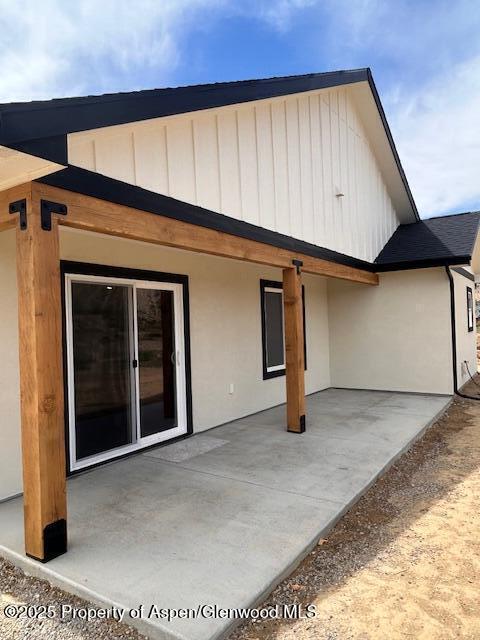 326 W 30th St, Rifle, CO 81650 - back of house with a patio area and stucco siding
