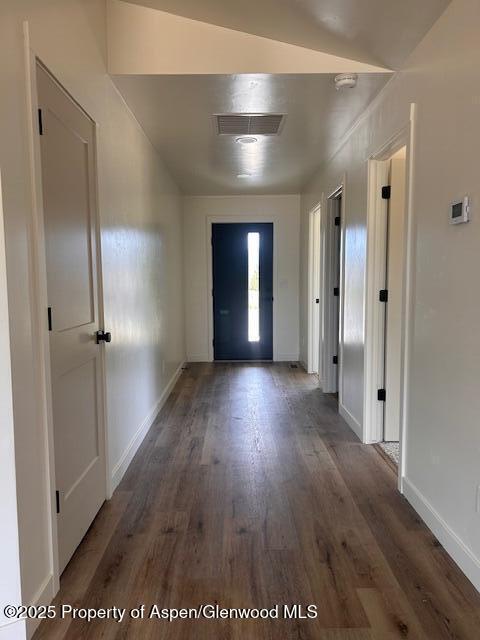 326 W 30th St, Rifle, CO 81650 - entrance foyer featuring wood finished floors and baseboards