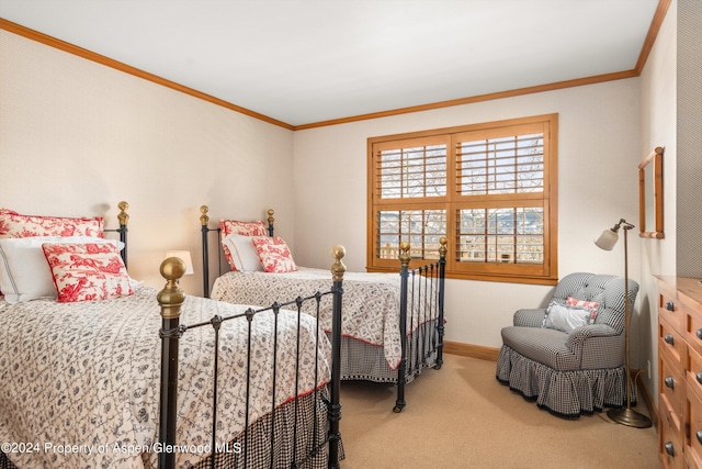 bedroom with carpet floors and ornamental molding