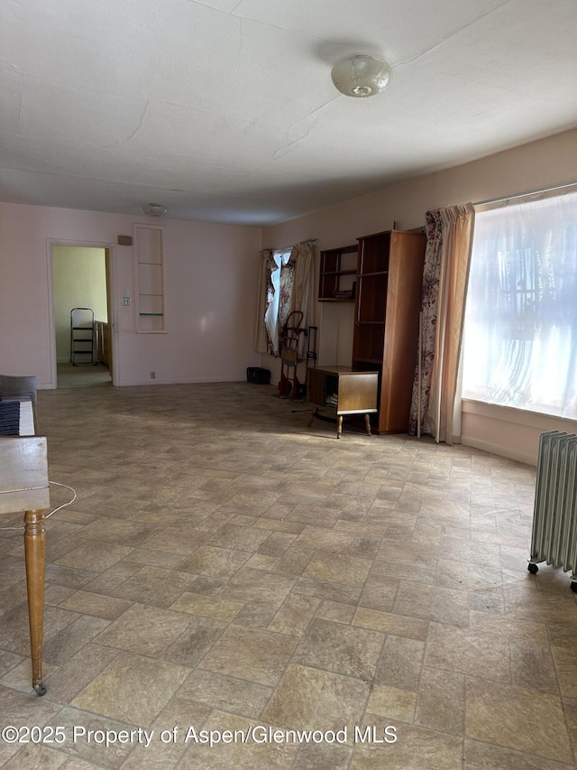 living room featuring radiator