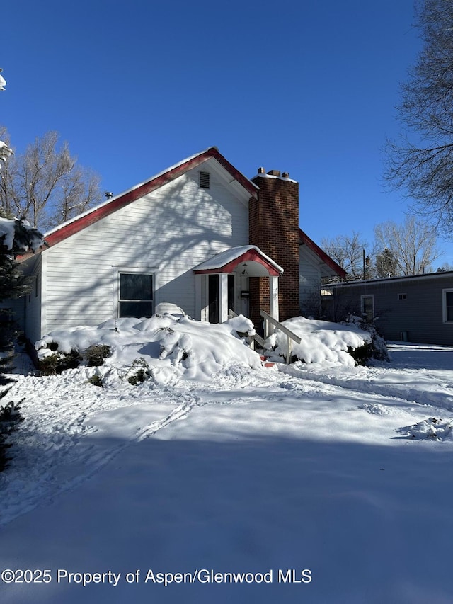 view of snow covered property