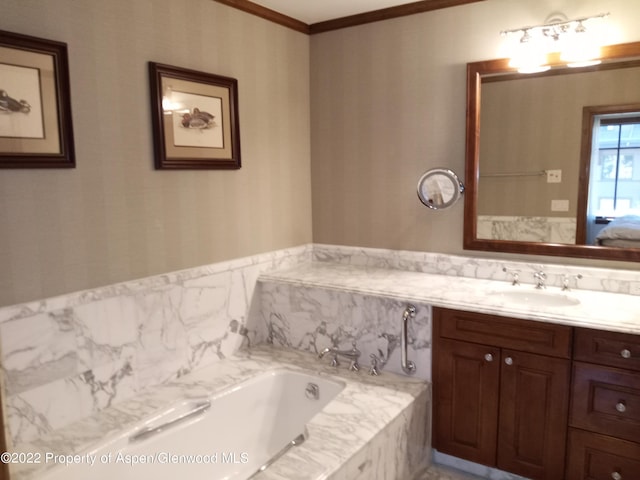 bathroom featuring vanity, tiled bath, and crown molding