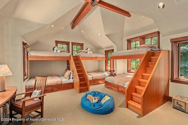 carpeted bedroom featuring lofted ceiling with beams and ceiling fan