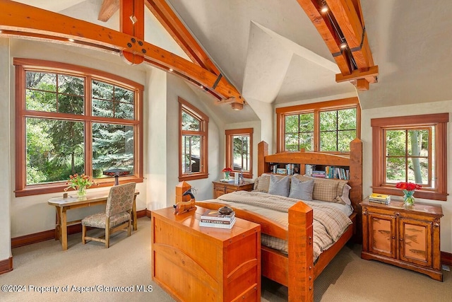 bedroom with light carpet, beamed ceiling, and high vaulted ceiling