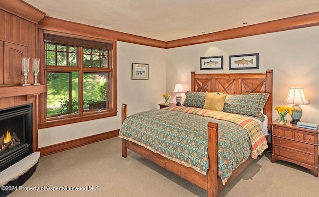 bedroom featuring light colored carpet