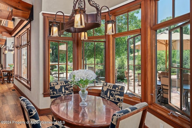 dining space featuring hardwood / wood-style floors