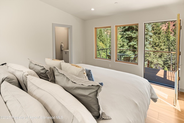768 Kings Lake Rd, Basalt, CO 81621 - bedroom featuring access to exterior, light wood-style flooring, recessed lighting, vaulted ceiling, and ensuite bathroom